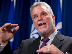 Philippe Couillard,l'espion bien payé ,le loup qui criait aux  loups et l'arroseur arrosé.
