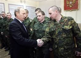 Le président Vladimir Poutine et ses soldats.